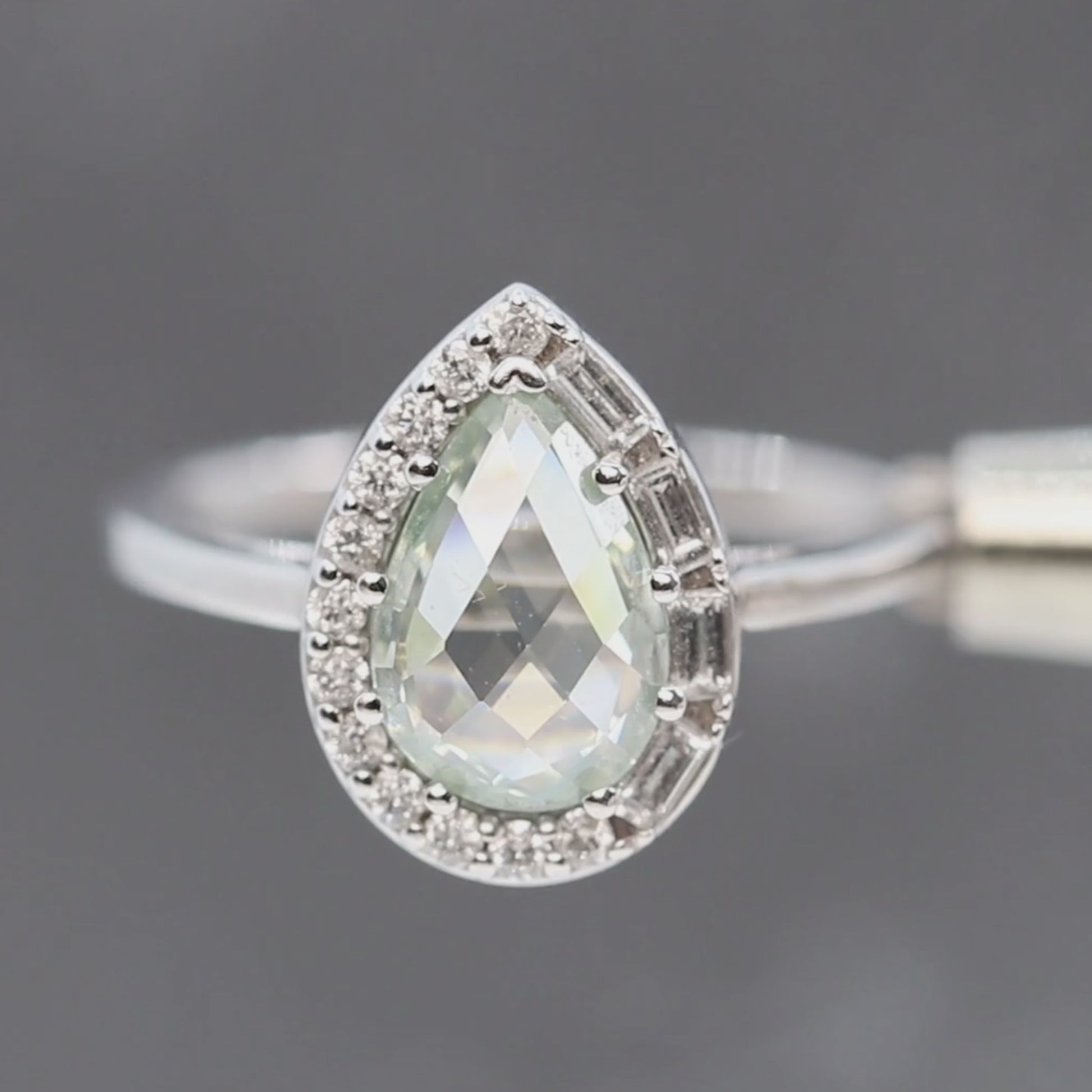 Collins Ring with a 1.00 Carat Clear Pear Moissanite and White Accent Diamonds in 10k White Gold - Ready to Size and Ship