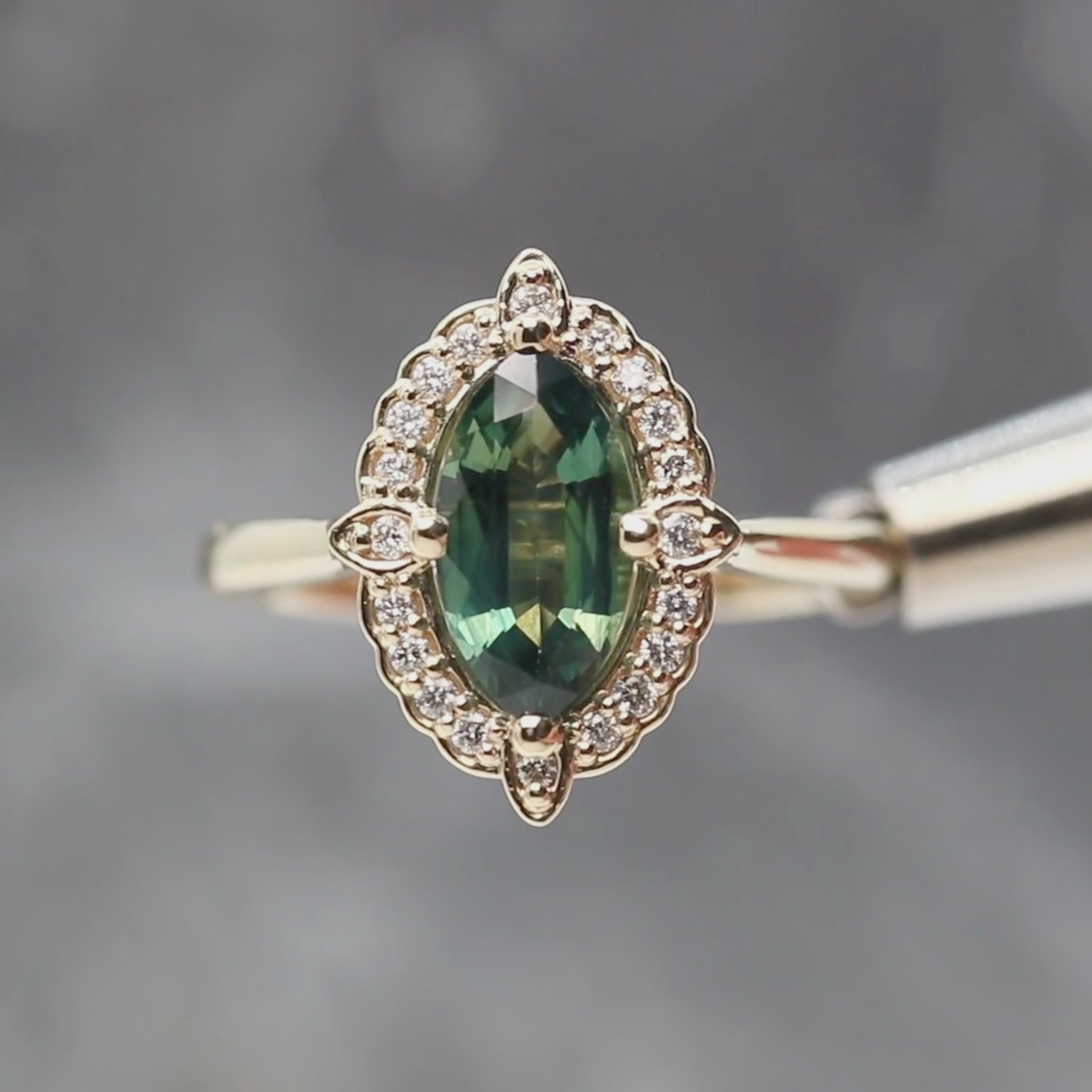 McKenzie Ring with a 1.66 Carat Teal Marquise Sapphire and White Accent Diamonds in 14k Yellow Gold - Ready to Size and Ship