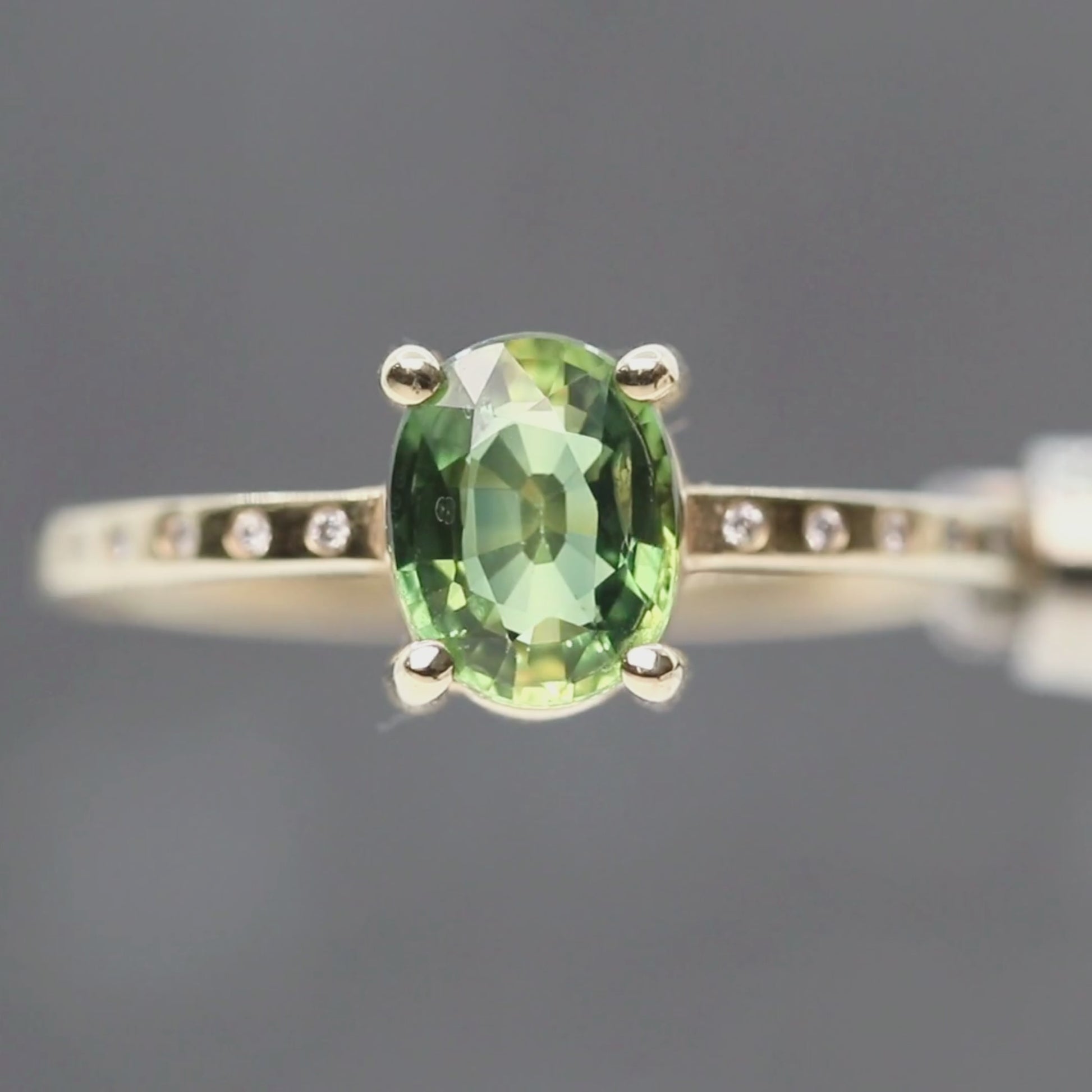 Heath Ring with a 1.20 Carat Green Oval Sapphire and White Accent Diamonds in 14k Yellow Gold - Ready to Size and Ship