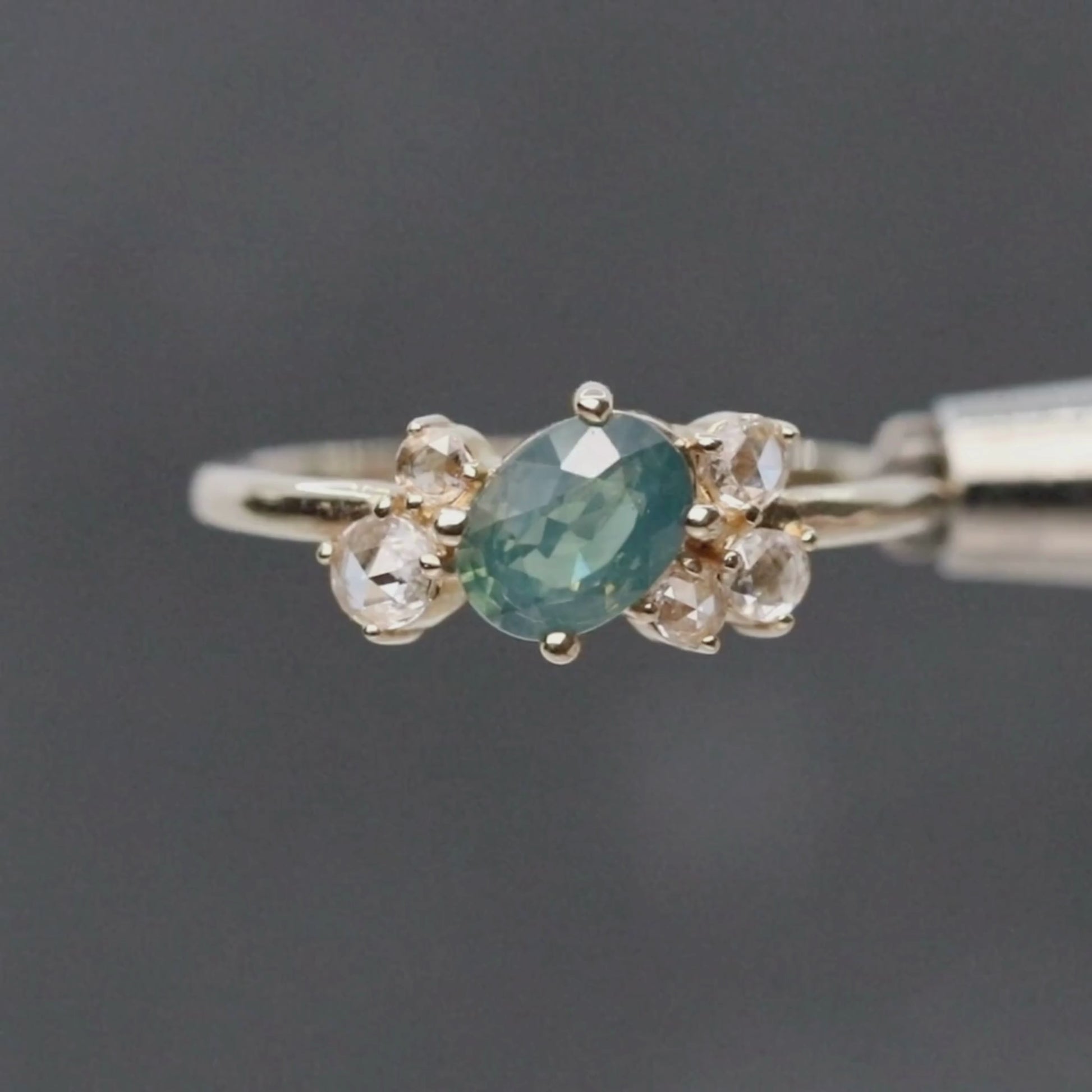 Lexus Ring with a 0.90 Carat Teal Oval Sapphire and Clear Diamond Accents in 10k Yellow Gold - Ready to Size and Ship