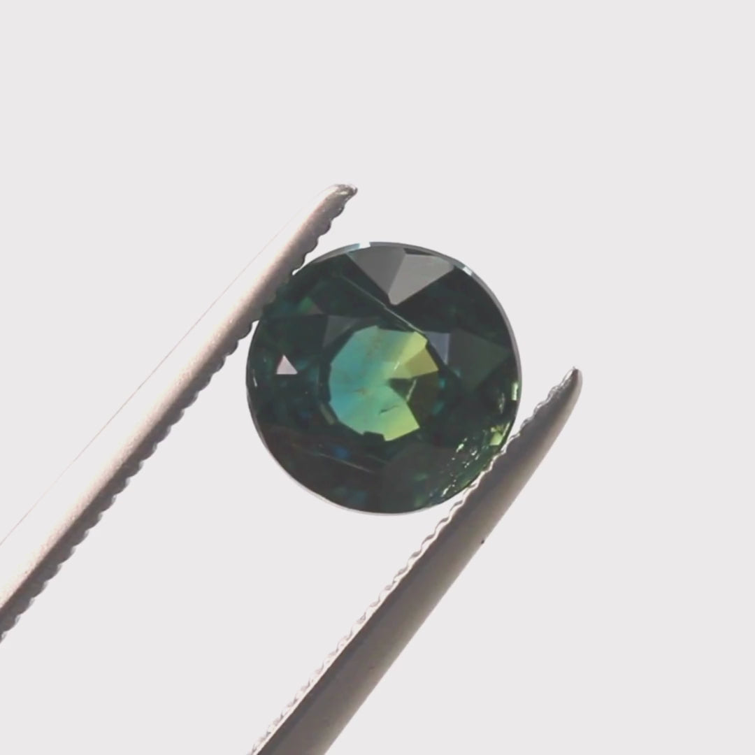 1.25 Carat Round Teal Green Sapphire for Custom Work - Inventory Code TGRS125