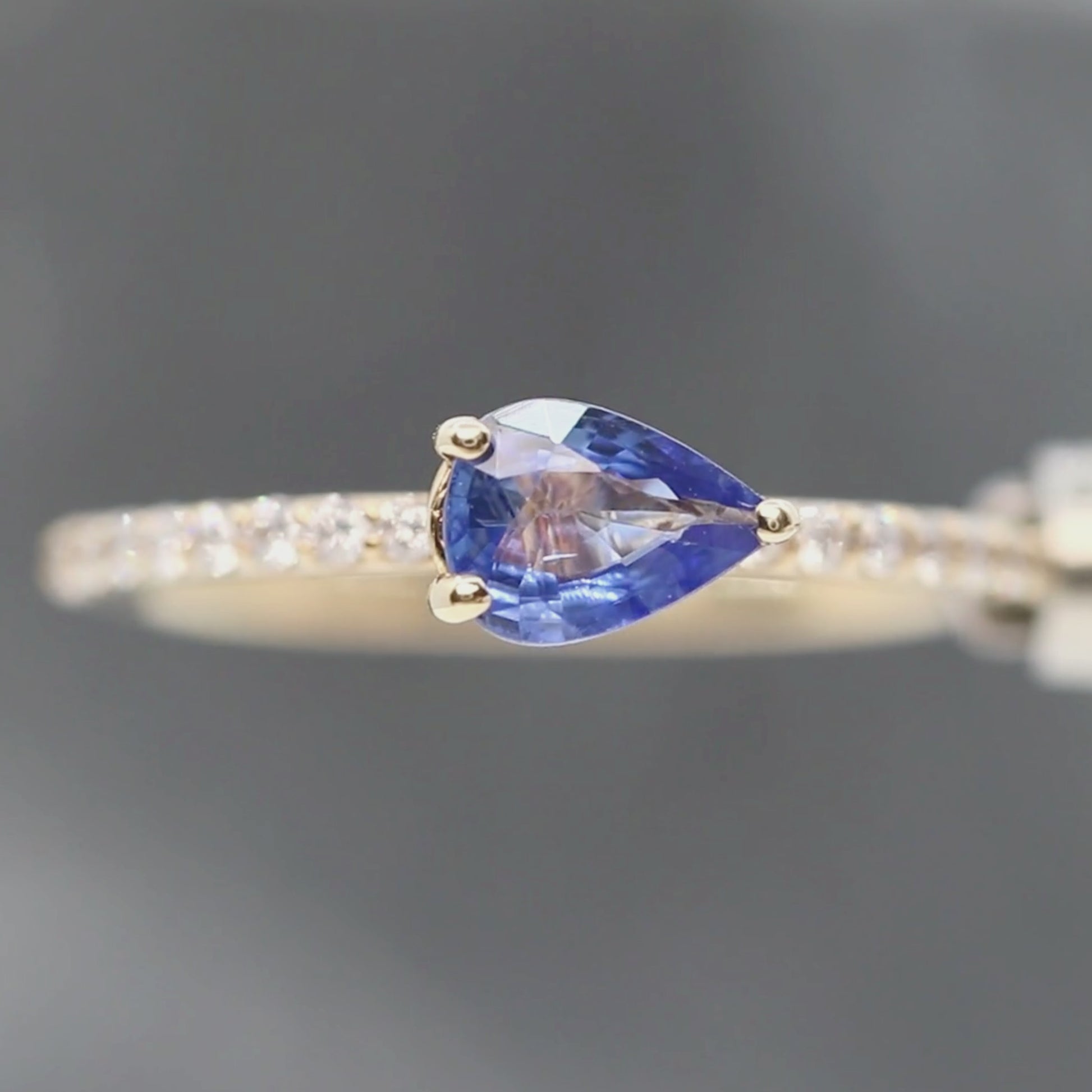 Gayle Ring with a 0.68 Carat Cornflower Blue Pear Sapphire and White Accent Diamonds in 10k Yellow Gold - Ready to Size and Ship