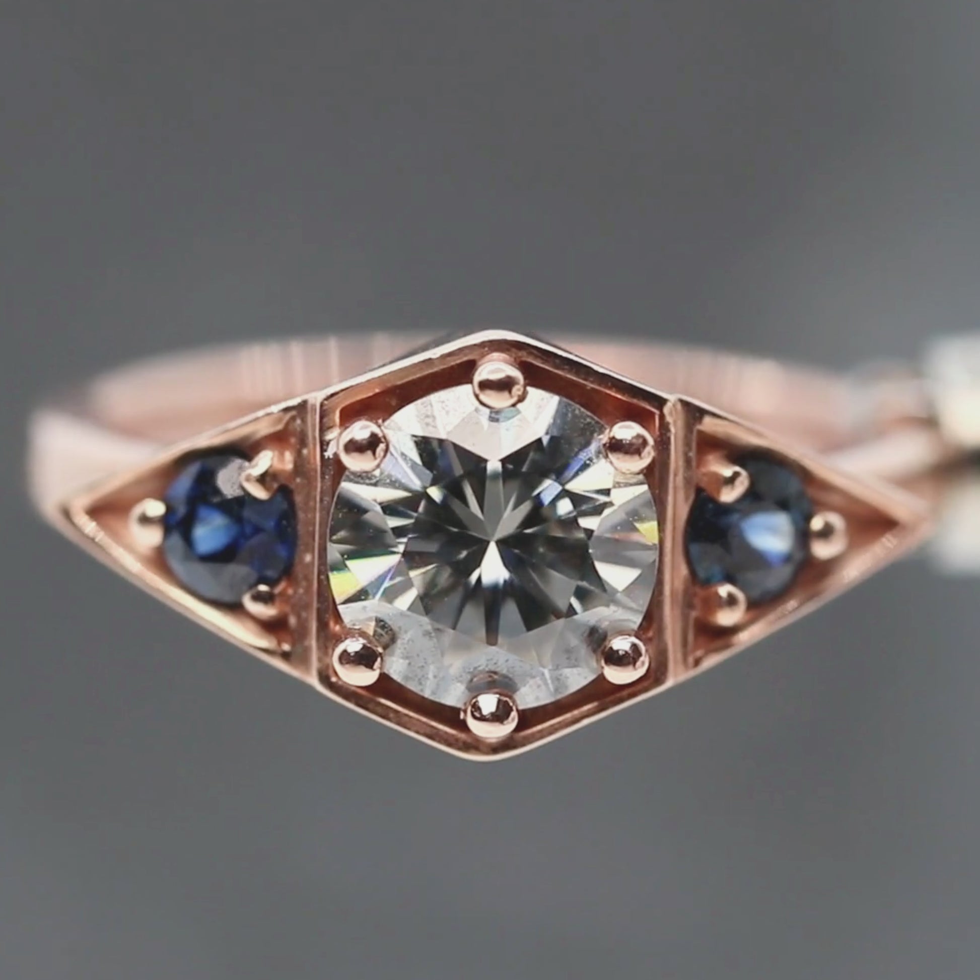 Cassia Ring with a 1.00 Carat Round Gray Moissanite and Blue Sapphire Accents in 10k Rose Gold - Ready to Size and Ship