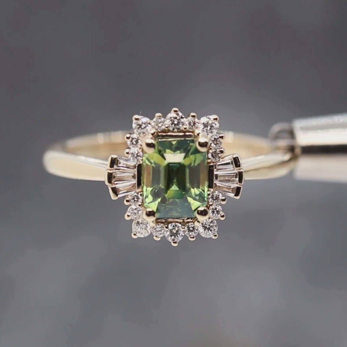 Meghan Ring with a 1.23 Carat Green Emerald Cut Sapphire and White Accent Diamonds in 14k Yellow Gold - Ready to Size and Ship