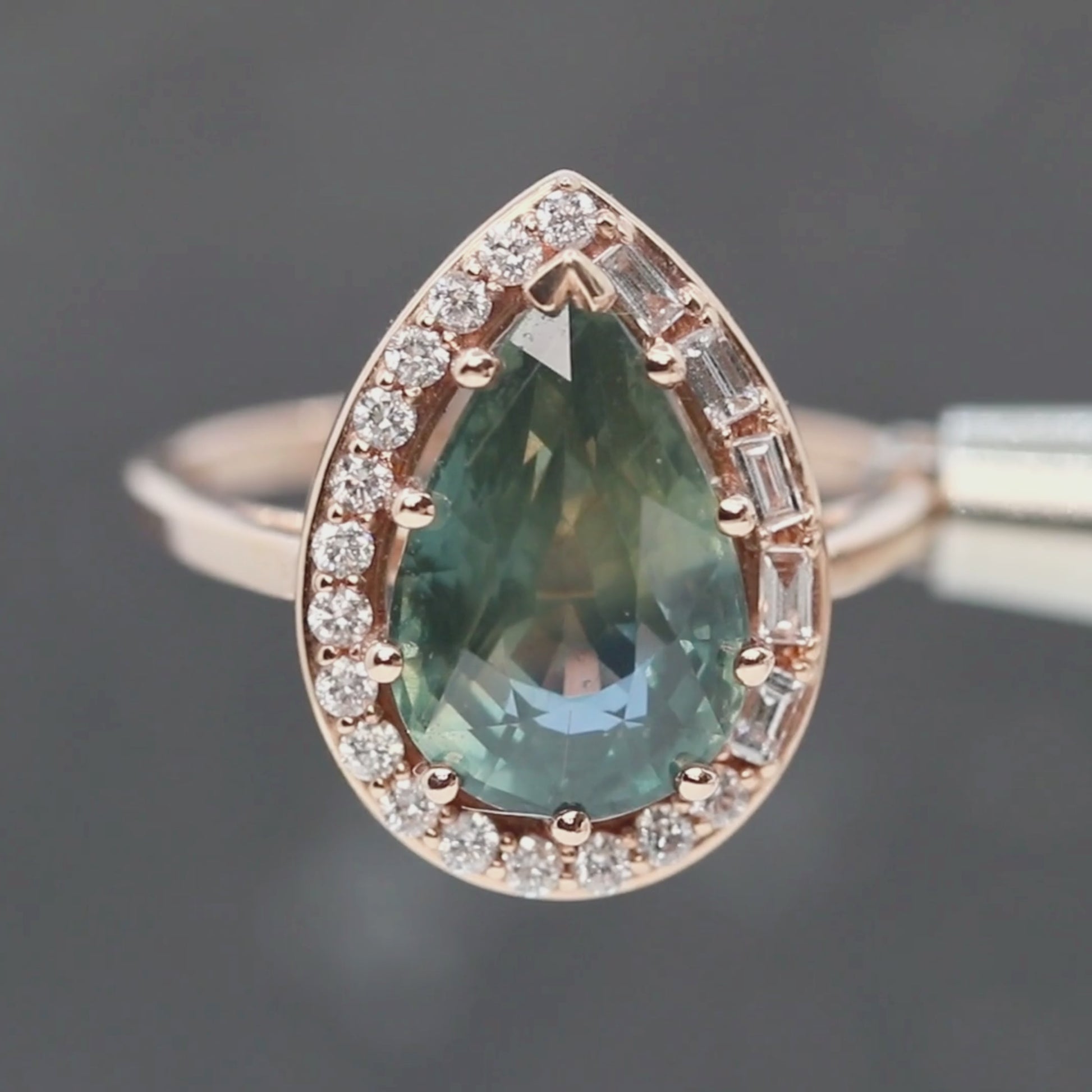 Collins Ring with a 6.21 Carat Teal Pear Sapphire and White Accent Diamonds in 14k Rose Gold - Ready to Size and Ship