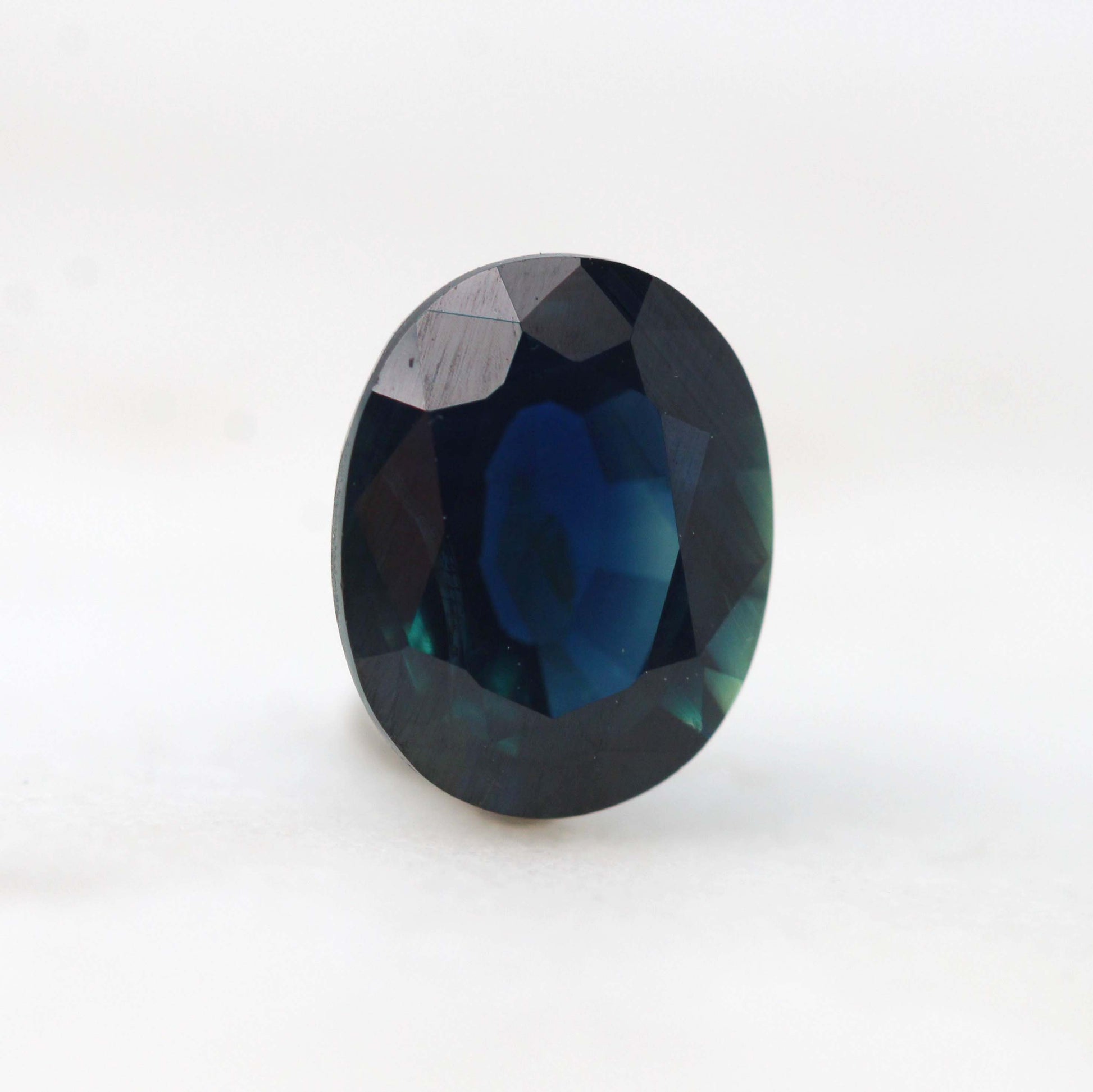 2.03 Carat Dark Teal Oval Sapphire for Custom Work - Inventory Code DTOS203 - Midwinter Co. Alternative Bridal Rings and Modern Fine Jewelry