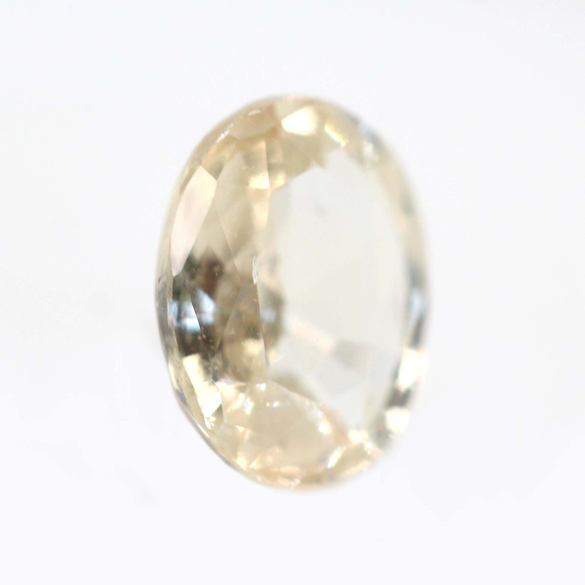 1.62 Carat Clear Golden Oval Sapphire for Custom Work - Inventory Code COSAP162 - Midwinter Co. Alternative Bridal Rings and Modern Fine Jewelry