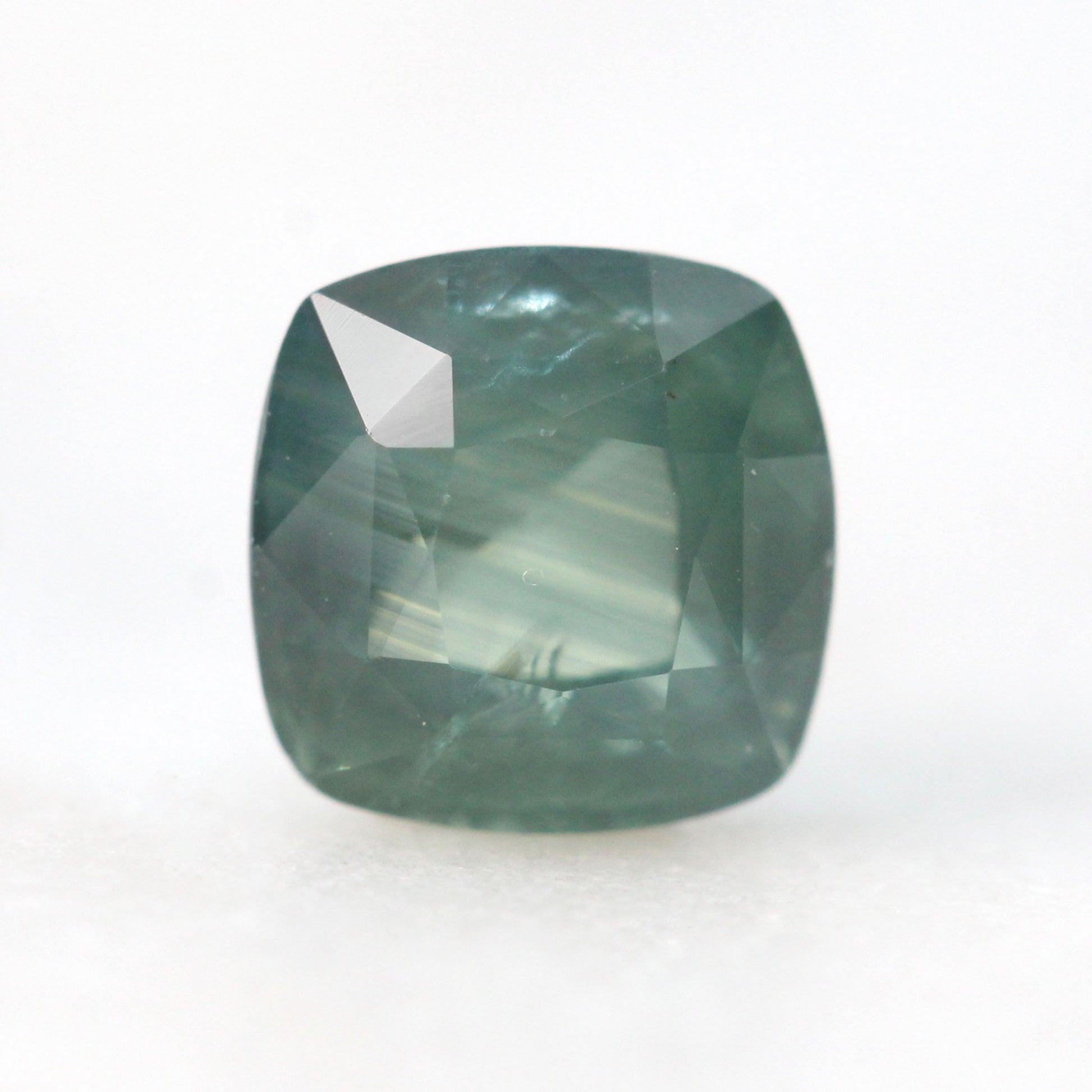 1.47 Carat Light Teal Cushion Sapphire for Custom Work - Inventory Code TCS147 - Midwinter Co. Alternative Bridal Rings and Modern Fine Jewelry