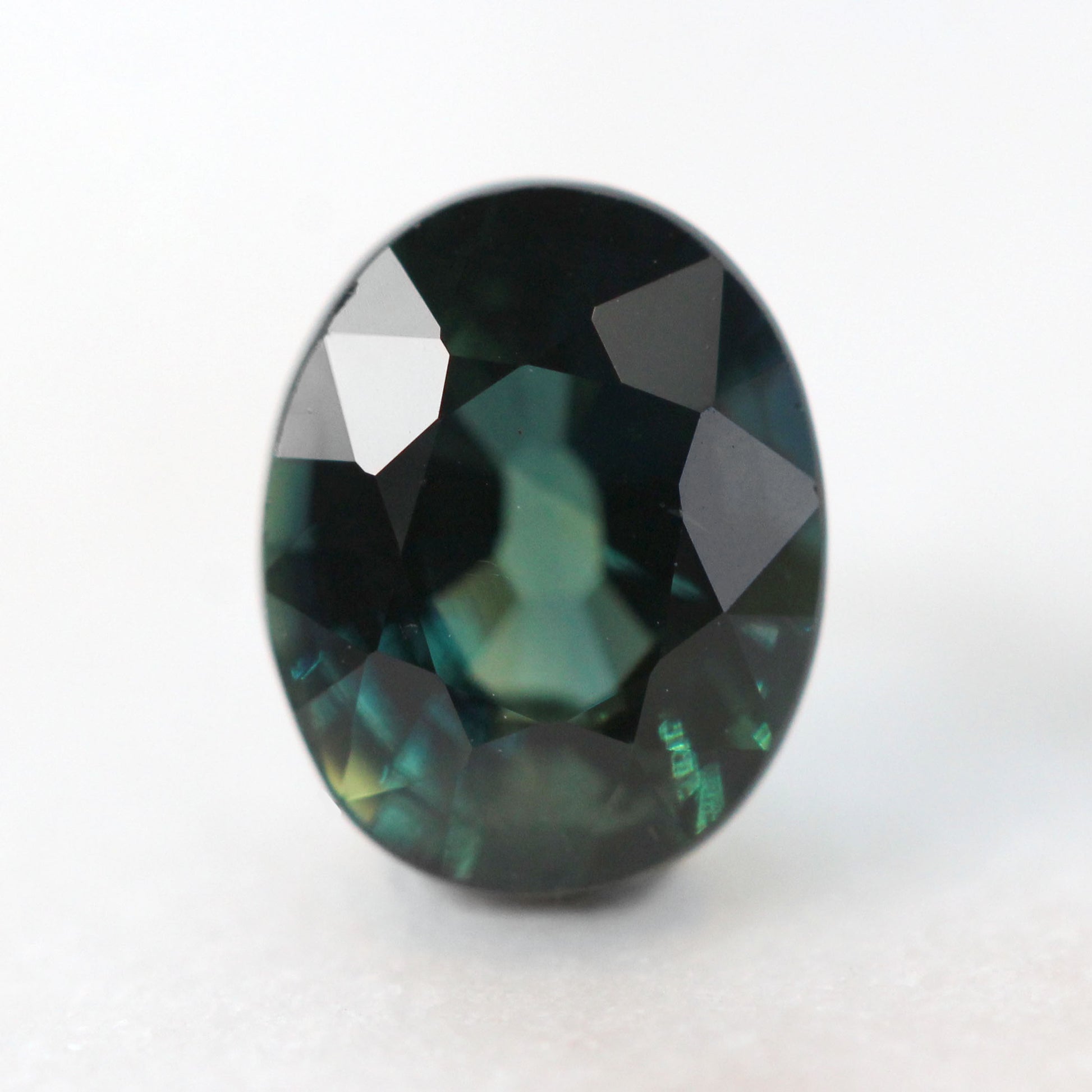 1.11 Carat Dark Teal Oval Australian Sapphire for Custom Work - Inventory Code TOS111 - Midwinter Co. Alternative Bridal Rings and Modern Fine Jewelry