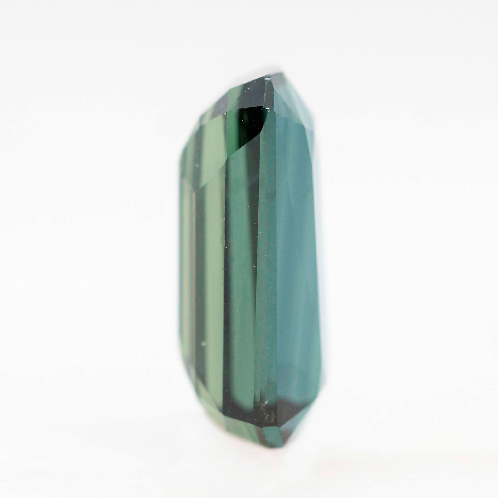 3.39 Carat Teal Elongated Emerald Cut Sapphire for Custom Work - Inventory Code TAS339 - Midwinter Co. Alternative Bridal Rings and Modern Fine Jewelry