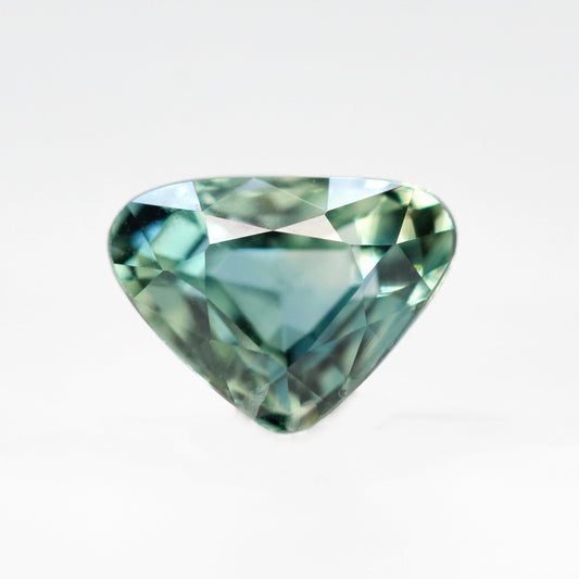CAELEN (J) 1.13 Carat Blue-Green Trillion Cut Sapphire for Custom Work - Inventory Code BGTS113 - Midwinter Co. Alternative Bridal Rings and Modern Fine Jewelry