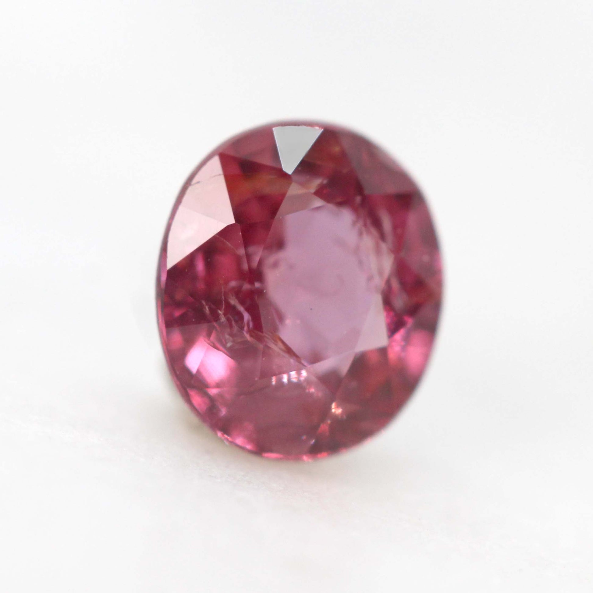 0.82 Carat Oval Red Pink Sapphire for Custom Work - Inventory Code PROS082 - Midwinter Co. Alternative Bridal Rings and Modern Fine Jewelry