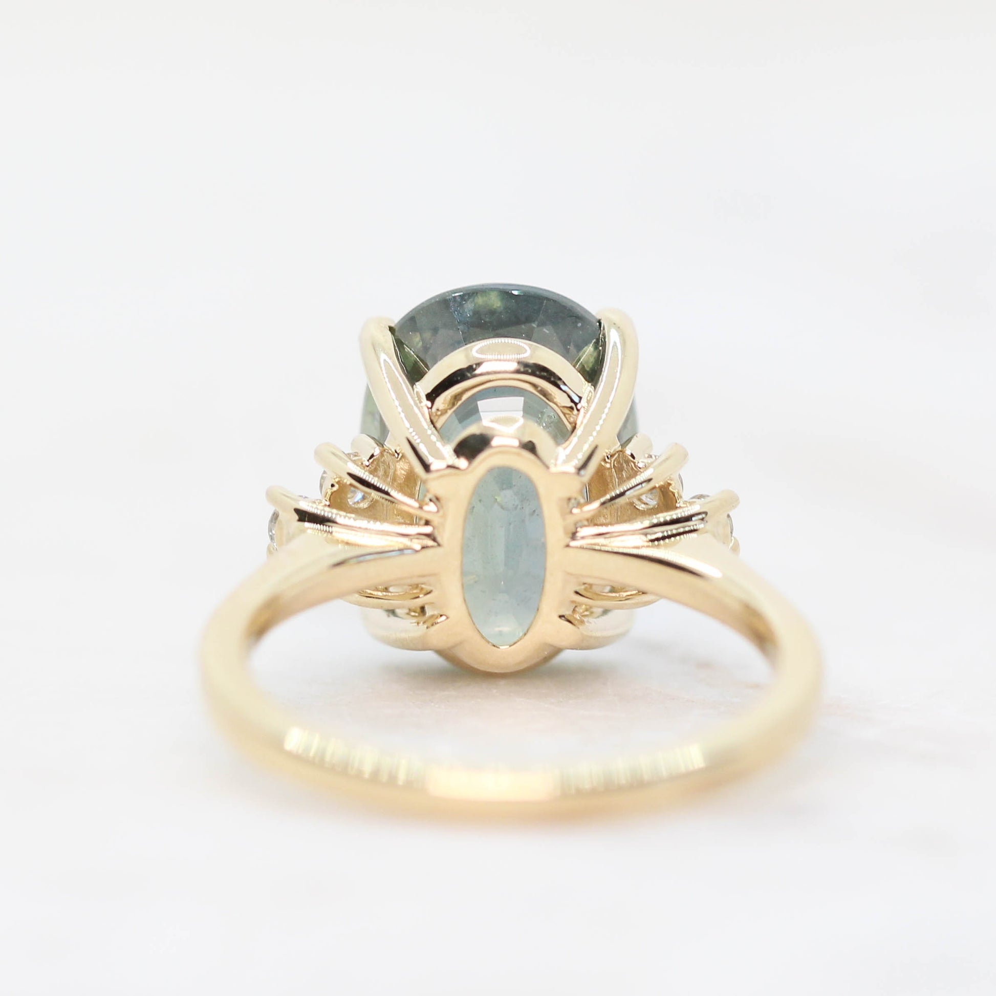 Veragene Ring with a 10.48 Carat Blue Green Oval Sapphire and White Accent Diamonds in 14k Yellow Gold - Ready to Size and Ship - Midwinter Co. Alternative Bridal Rings and Modern Fine Jewelry