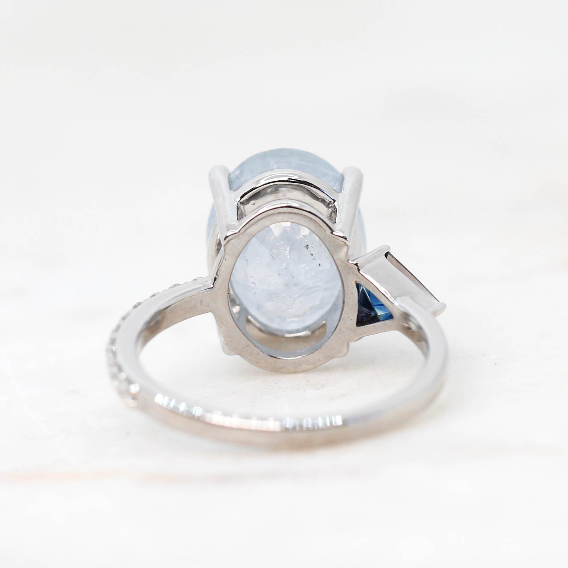Zephyr Ring with a 6.62 Carat Light Blue Sapphire, Accent Sapphire and Accent Diamonds in 14k White Gold - Ready to Size and Ship - Midwinter Co. Alternative Bridal Rings and Modern Fine Jewelry