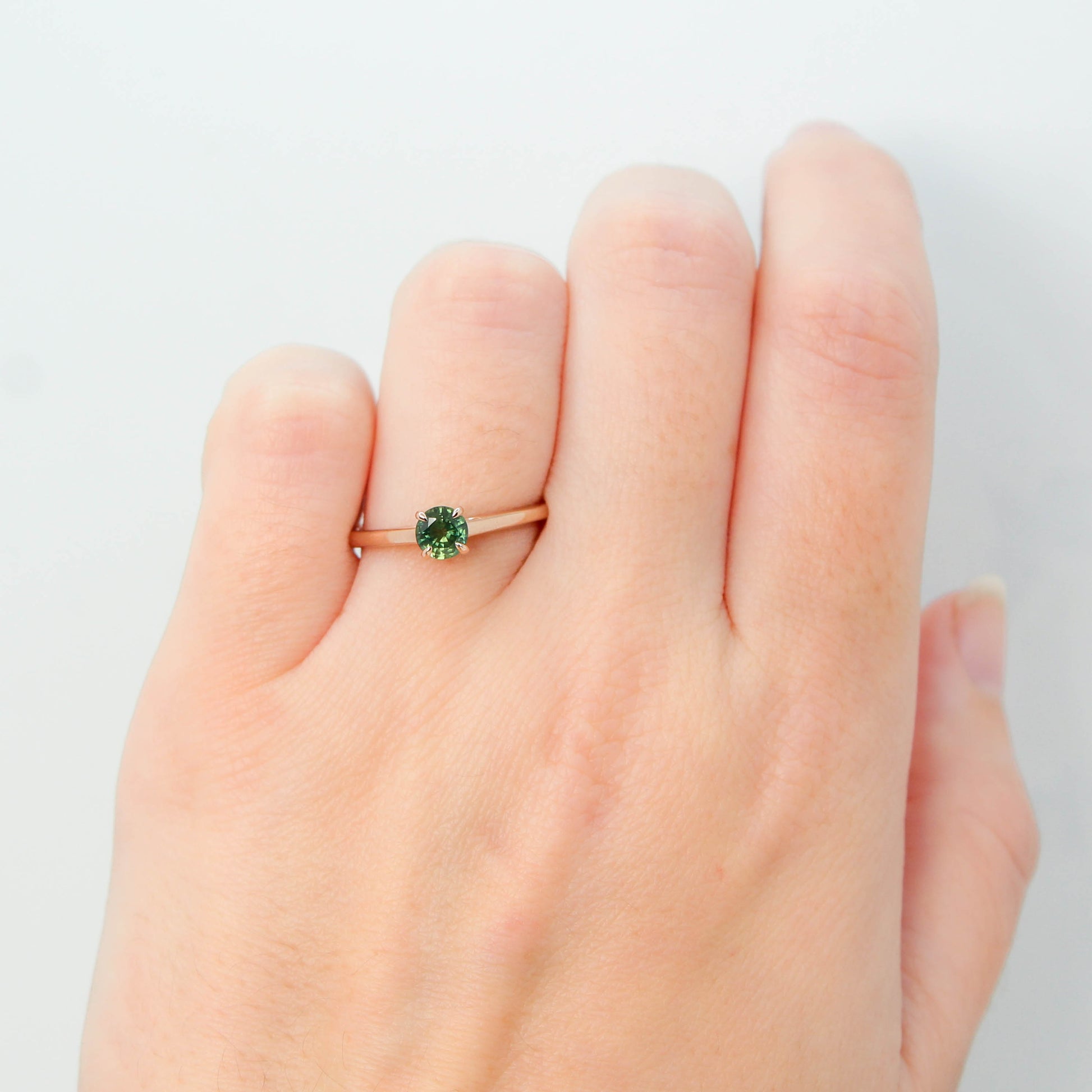 Elle Ring with a 0.49 Carat Teal Green Round Australian Sapphire in 14k Rose Gold - Ready to Size and Ship - Midwinter Co. Alternative Bridal Rings and Modern Fine Jewelry