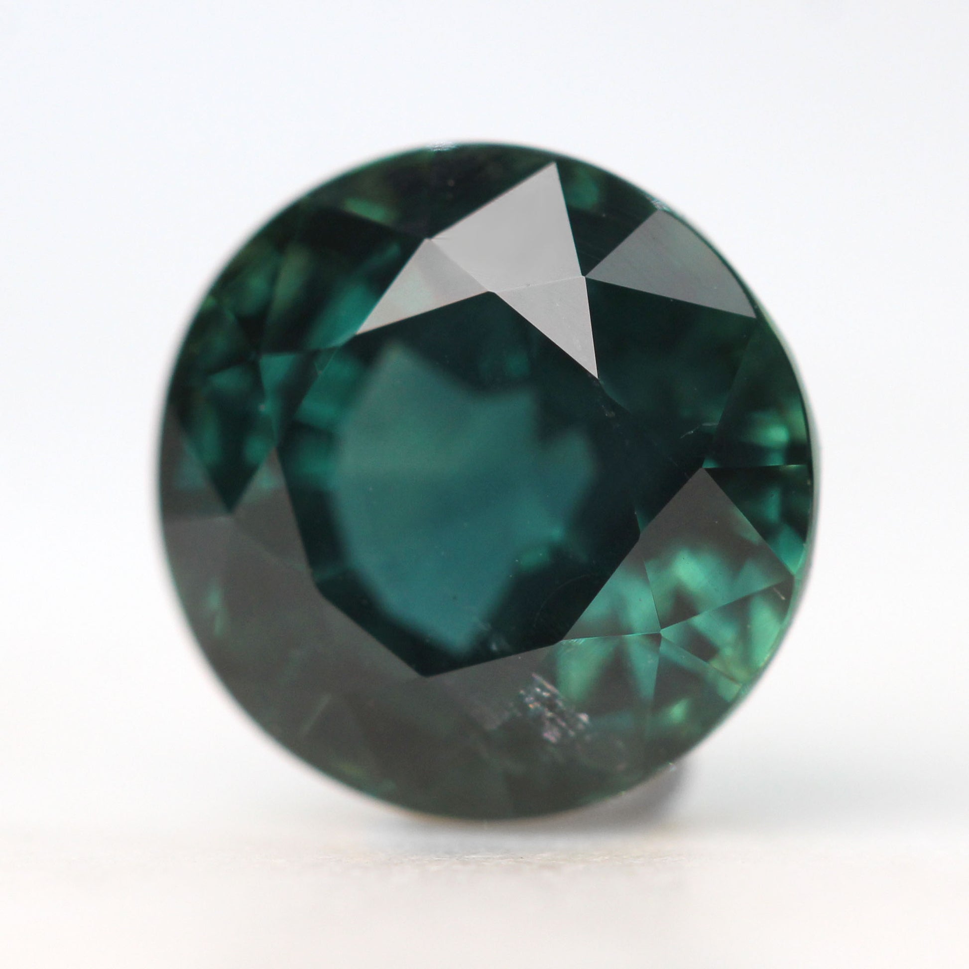 4.87 Carat GIA Certified Round Dark Teal Green Sapphire for Custom Work - Inventory Code RGSAP487 - Midwinter Co. Alternative Bridal Rings and Modern Fine Jewelry