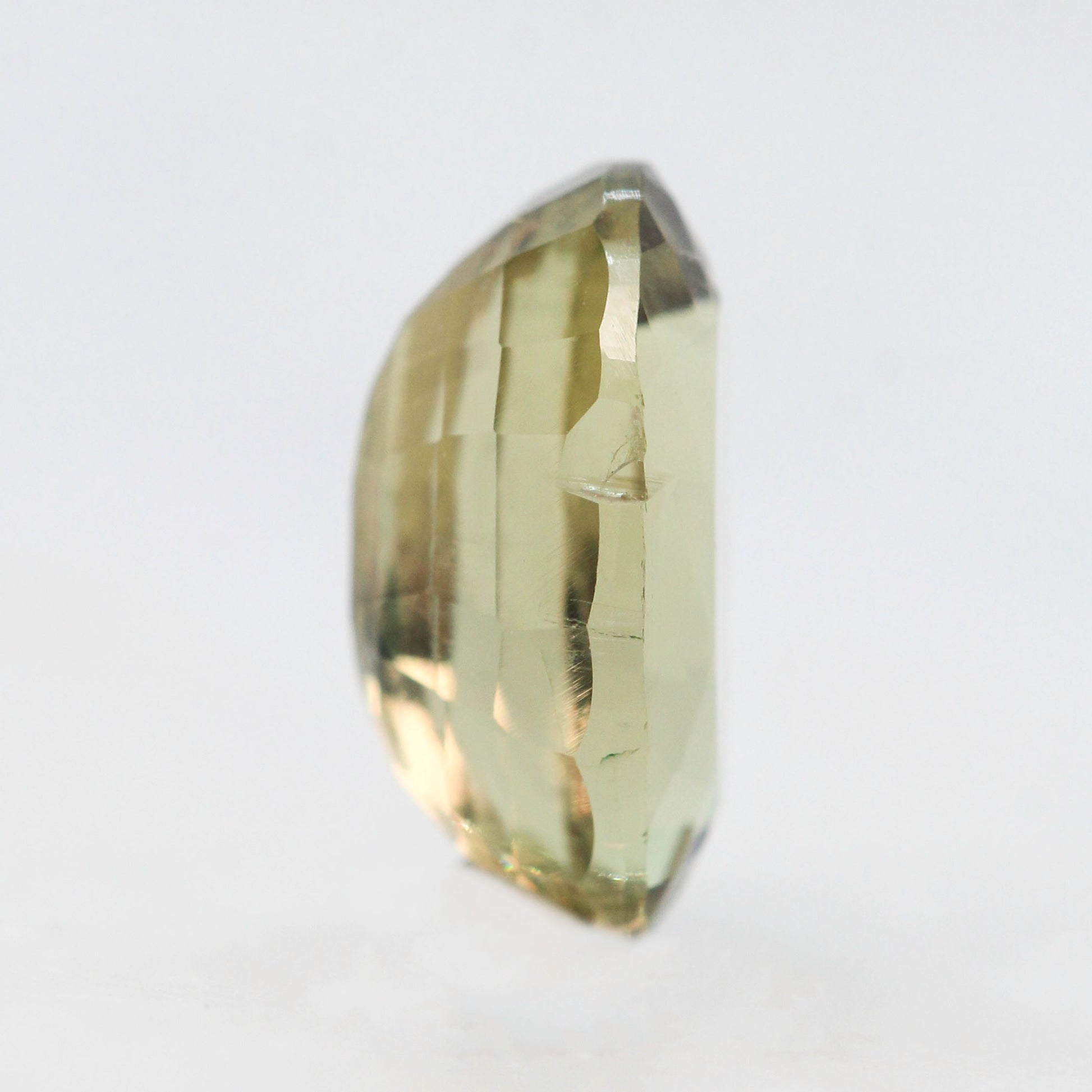 3.40 Carat Yellow-Green Oval Sapphire for Custom Work - Inventory Code YGOS340 - Midwinter Co. Alternative Bridal Rings and Modern Fine Jewelry