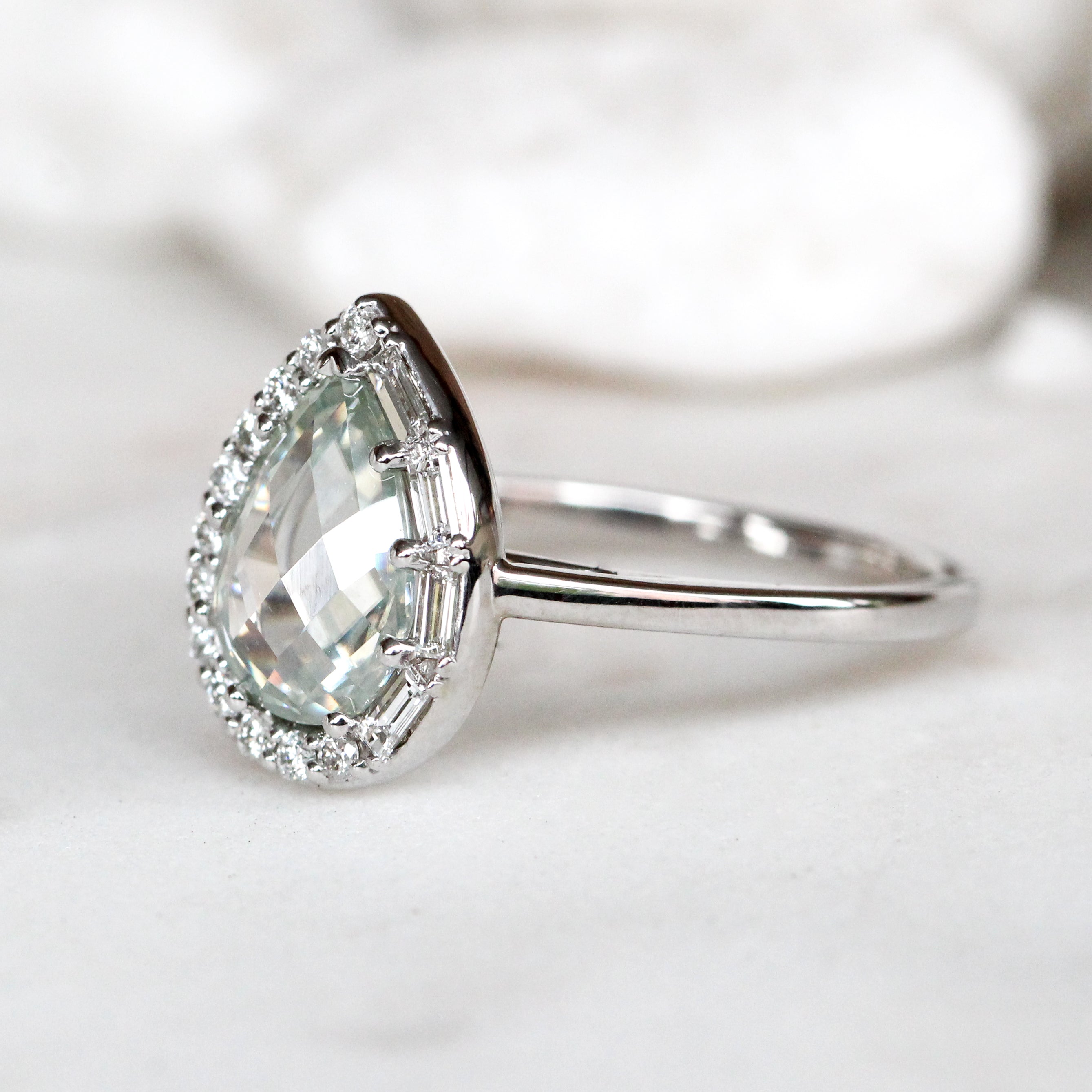 Collins Ring with a 1 Carat Clear Moissanite and White Accent Diamonds in 10k White Gold - Ready to Size and Ship - Midwinter Co. Alternative Bridal Rings and Modern Fine Jewelry
