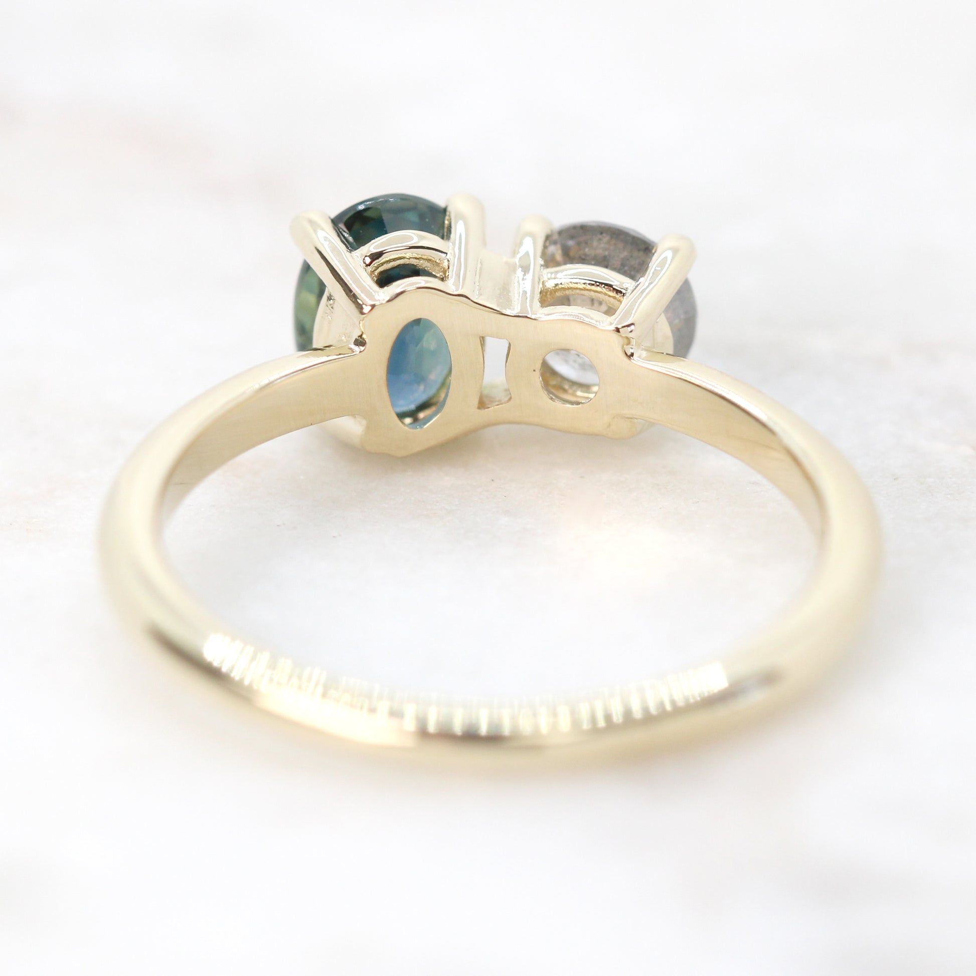 Toi et Moi Ring with a 0.58 Light Gray Round Celestial Diamond and a 1.11 Carat Teal Blue Oval Sapphire in 14k Yellow Gold - Ready to Size and Ship - Midwinter Co. Alternative Bridal Rings and Modern Fine Jewelry