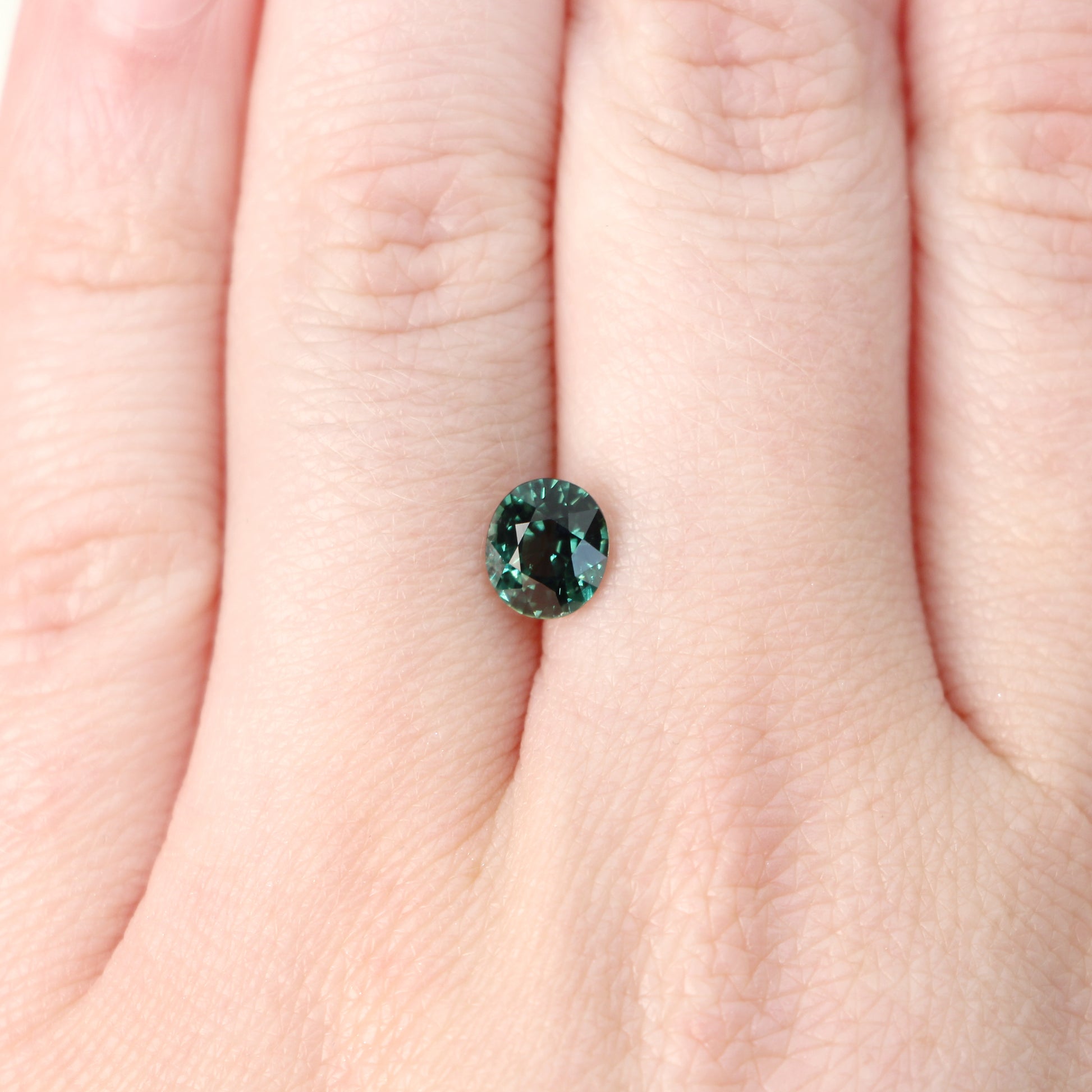 1.27 Carat Teal Green Oval Madagascar Sapphire for Custom Work - Inventory Code TGOS127 - Midwinter Co. Alternative Bridal Rings and Modern Fine Jewelry