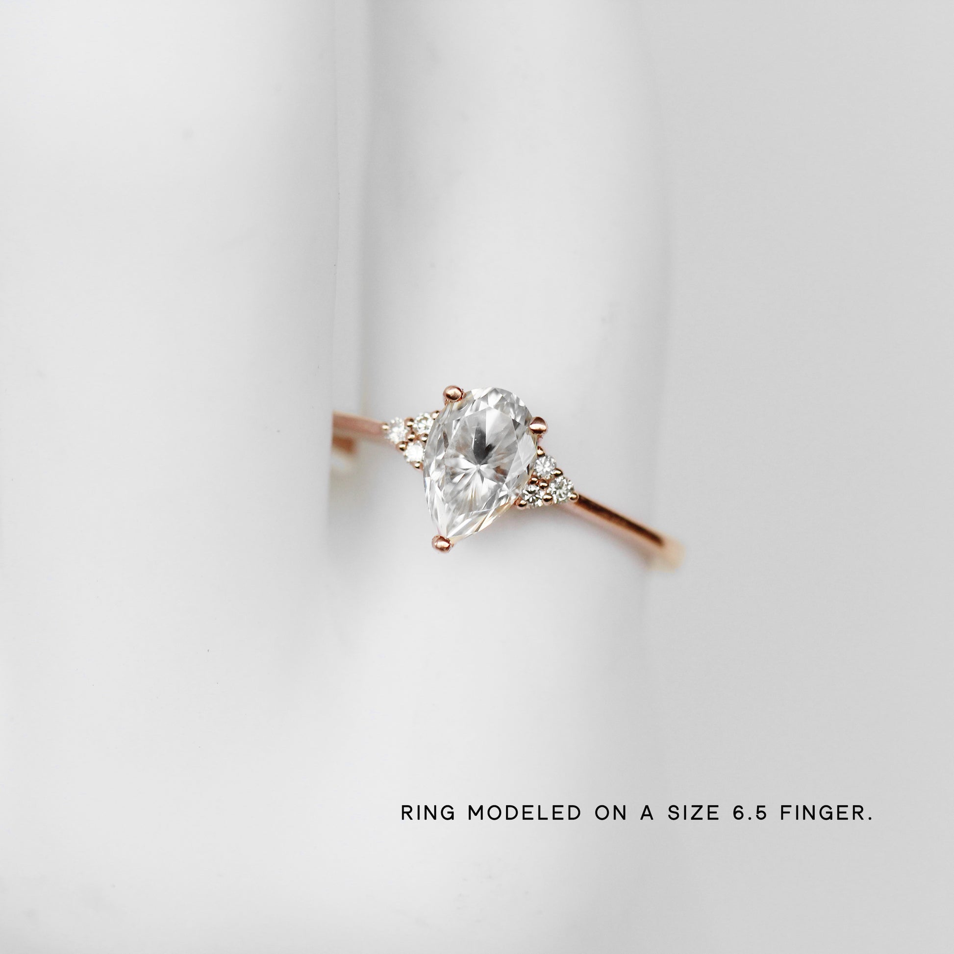 Imogene Ring with a Pear Moissanite and diamonds in your choice of gold - Midwinter Co. Alternative Bridal Rings and Modern Fine Jewelry