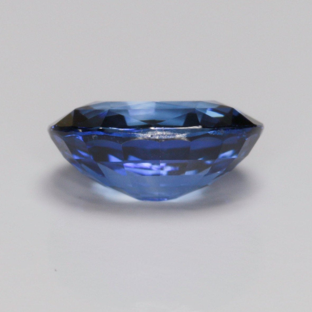 1.00 carat dark blue oval sapphire - custom work - inventory code: DBOS10 - Midwinter Co. Alternative Bridal Rings and Modern Fine Jewelry